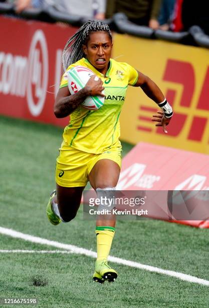 Ellia Green of Australia runs with the ball against New Zealand during the HSBC World Rugby Sevens Series Gold medal match at Westhills Stadium on...