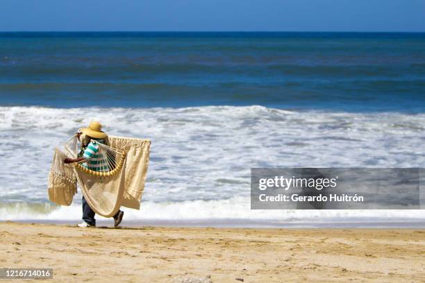 man with informal job selling amacas - nayarit stock pictures, royalty-free photos & images