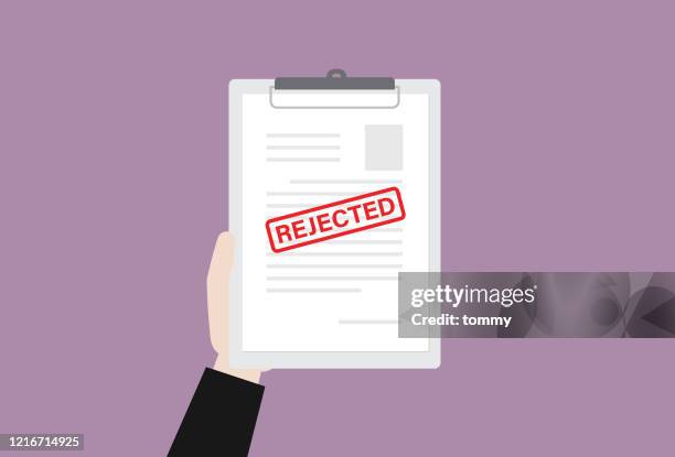 businessman holds an rejected document - interview rejection stock illustrations