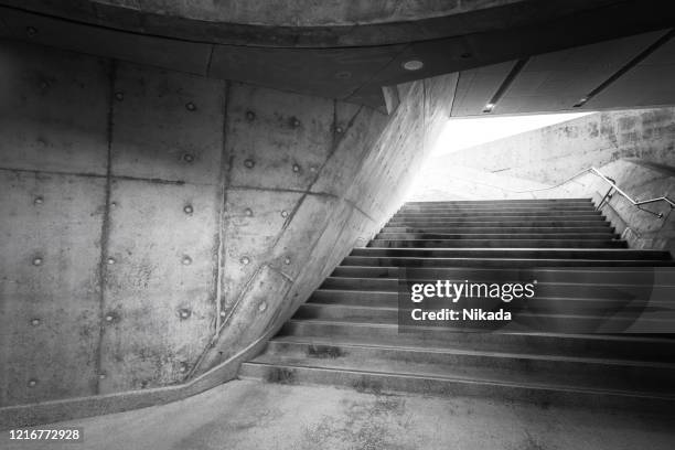 stairway leading up and abstract geometric concrete architecture - concrete stairs stock pictures, royalty-free photos & images