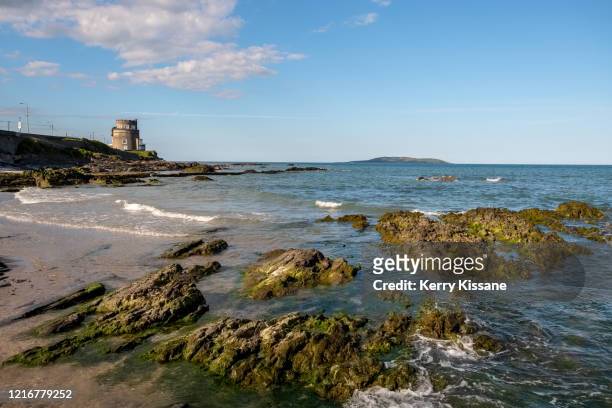 portmarnock beach in dublin - martello tower stockfoto's en -beelden
