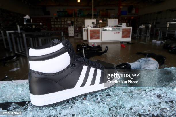 Interior view of a ransacked sneaker store wall in the Mt Airy/Wadsworth sections of Northwest Philadelphia, PA on June 1, 2020. Overnight several...