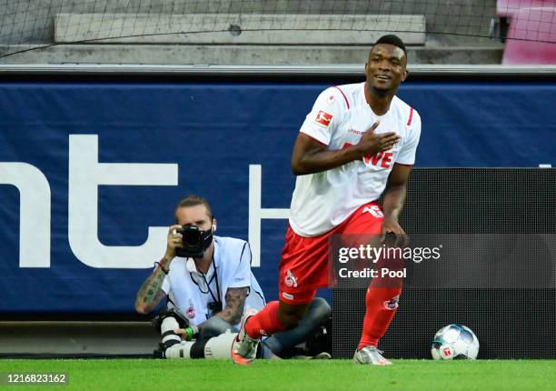 Jhon Cordoba of Koeln celebrates scoring his sides first goal during the Bundesliga match between 1. FC Koeln and RB Leipzig at RheinEnergieStadion...