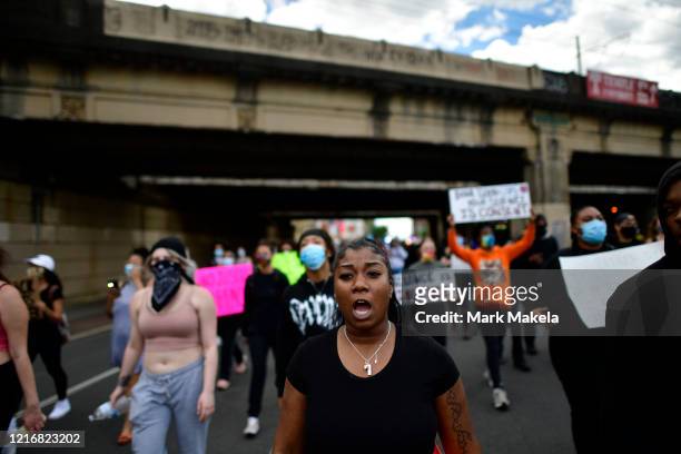 Protesters march in the aftermath of widespread unrest following the death of George Floyd on June 1, 2020 in Philadelphia, Pennsylvania....