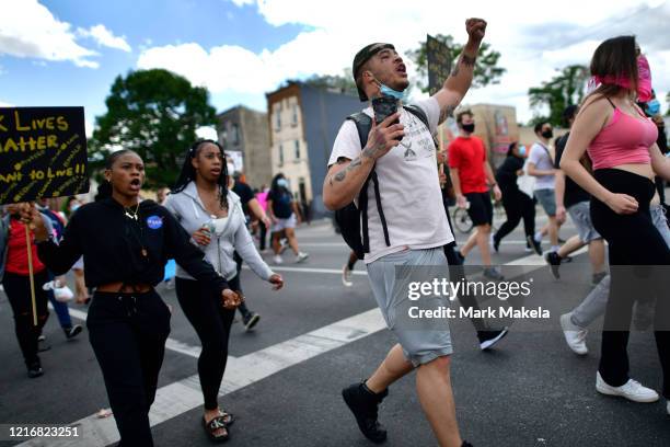 Protesters march in the aftermath of widespread unrest following the death of George Floyd on June 1, 2020 in Philadelphia, Pennsylvania....