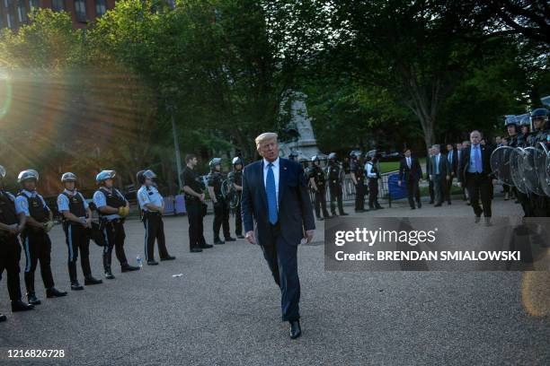 President Donald Trump leaves the White House on foot to go to St John's Episcopal church across Lafayette Park in Washington, DC on June 1, 2020. US...