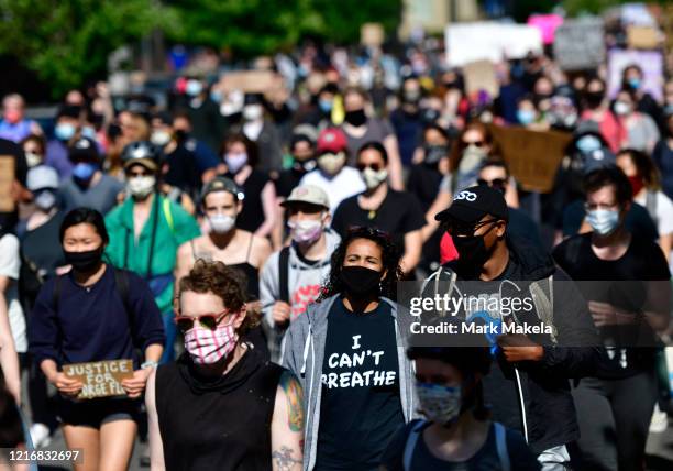 Protester wearing a "I CAN'T BREATHE" t-shirt marches through Center City on June 1, 2020 in Philadelphia, Pennsylvania. Demonstrations have erupted...