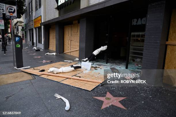 Mannequin is seen on the street after a store was broken into in Hollywood, California on June 1 after a third day of protests and looting in...