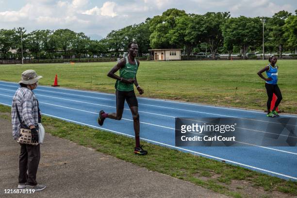 Year-old South Sudanese 1500m runner Abraham Majok Matet Guem trains at an athletics track on June 2, 2020 in Maebashi, Gunma, Japan. The four South...