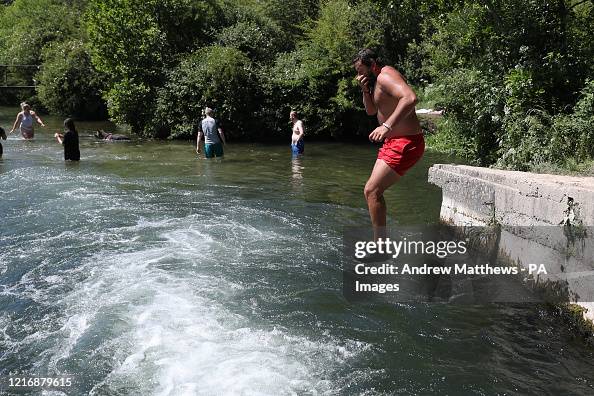 Compton Lock A person jumps into the water at Compton Lock on the River Itchen ...