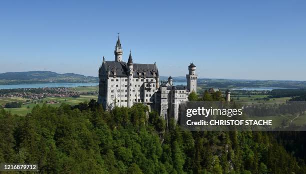 The iconic Neuschwanstein castle is pictured near the village of Hohenschwangau in southern Germany during its reopening on June 2 amid the novel...