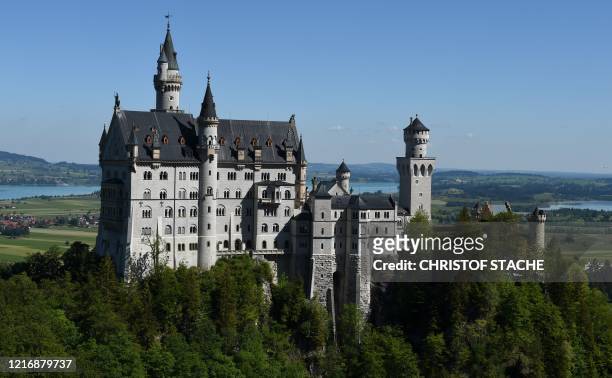 The iconic Neuschwanstein castle is pictured near the village of Hohenschwangau in southern Germany during its reopening on June 2 amid the novel...