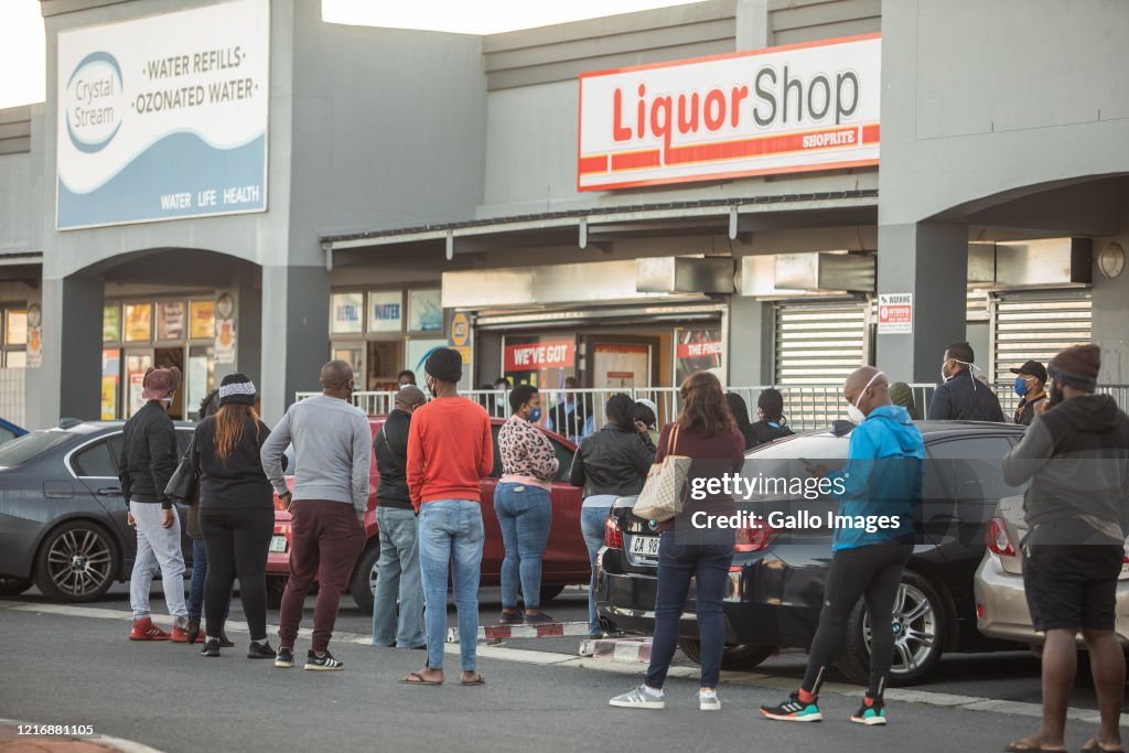 Consumers queue at liquor stores in Cape Town as sales resume in level 3 in South Africa
