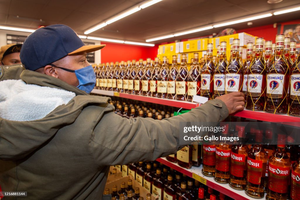 Consumers queue at liquor stores in Cape Town as sales resume in level 3 in South Africa