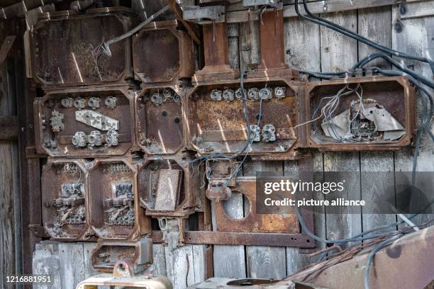 April 2020, Brandenburg, Rüdersdorf: Fuse boxes of the shaft furnace plant in the Rüdersdorf Museum Park. The 17-hectare Museum Park offers stories...