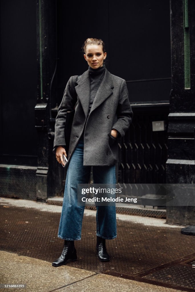Model Rebecca Leigh Longendyke wears a boxy gray peacoat, blue jeans ...