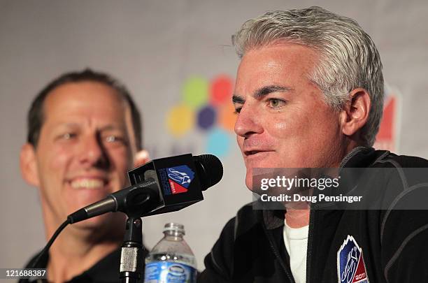 Shawn Hunter , CEO of the USA Pro Cycling Challenge addresses the media as Jim Birrell Race Director looks on during a press conference on the eve of...