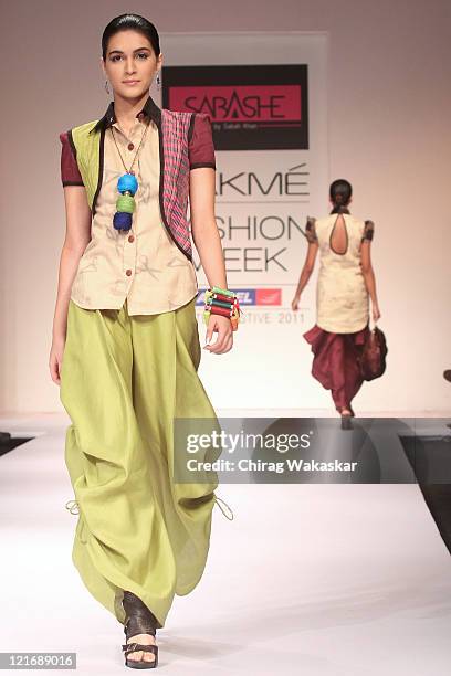 Model walks the runway at the Sabashe by Sabah Khan show at Lakme Fashion Week Winter/Festive 2011 Day 5 at the Grand Hyatt on August 21, 2011 in...