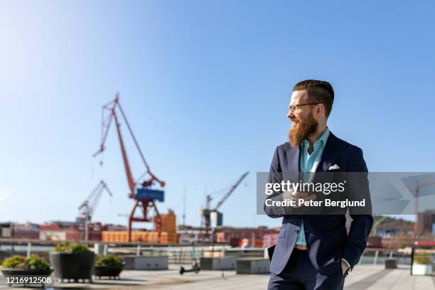 businessman using a smartphone - gothenburg stock pictures, royalty-free photos & images