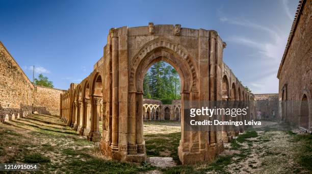 ruins of the cloister of the monastery of san juan de duero in soria, castilla león, spain - castilla leon fotografías e imágenes de stock