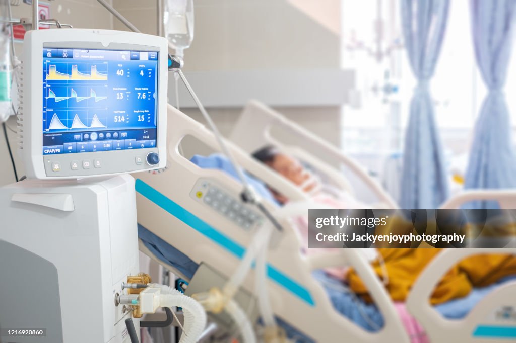 Ventilator monitor ,given oxygen by intubation tube to patient, setting in ICU/Emergency room