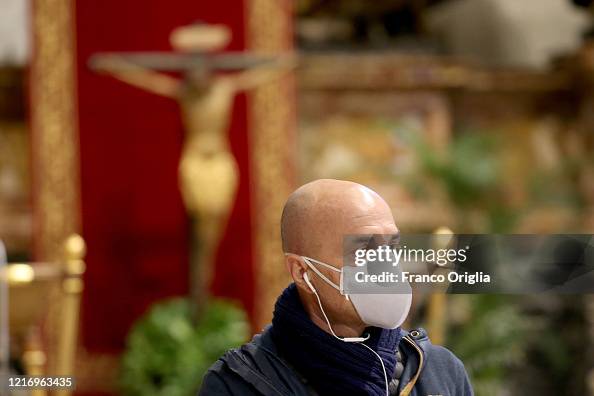 Vatican Mask A Vatican employee wearing a protective mask attends Pope Francis ...