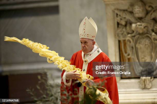 Pope Francis attends the Palm Sunday Mass in an empty Vatican Basilica of St. Peter's due to the Covid-19 coronavirus pandemic, on April 05, 2020 in...