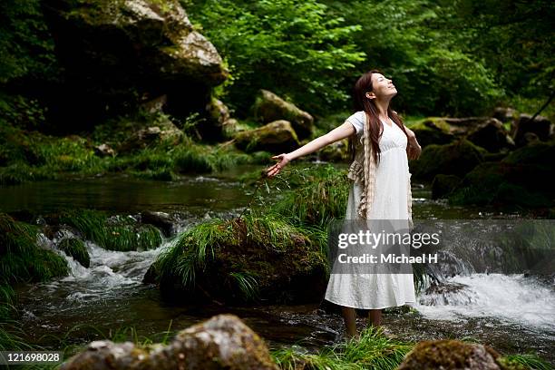 woman who enjoys rich nature - forest bathing stock pictures, royalty-free photos & images