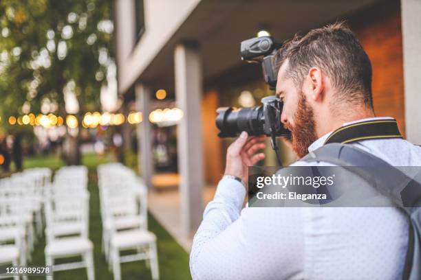 Photographe Professionnel Avec L'appareil-photo Homme Prenant Des