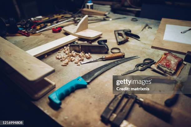 carpenters working desk with airplane model - workbench stock pictures, royalty-free photos & images