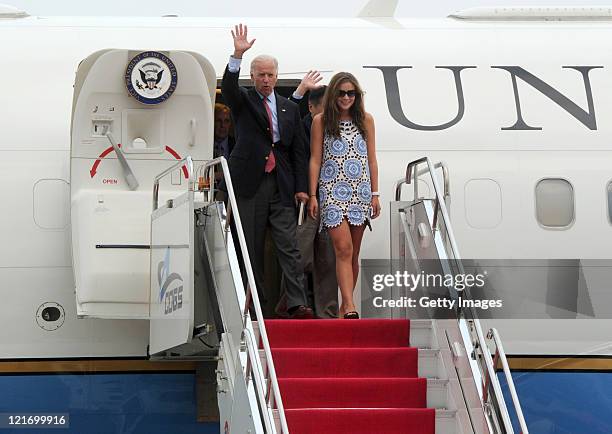 Vice President Joe Biden and his granddaughter Naomi Biden arrive in Chengdud during his visit to China on August 20, 2011 in Chengdu, Sichuan...