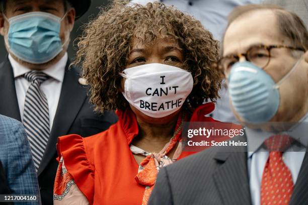 Gwen Carr, racial justice activist and mother of Eric Garner, looks on at a press conference calling for a ban on police chokeholds in Foley Square...