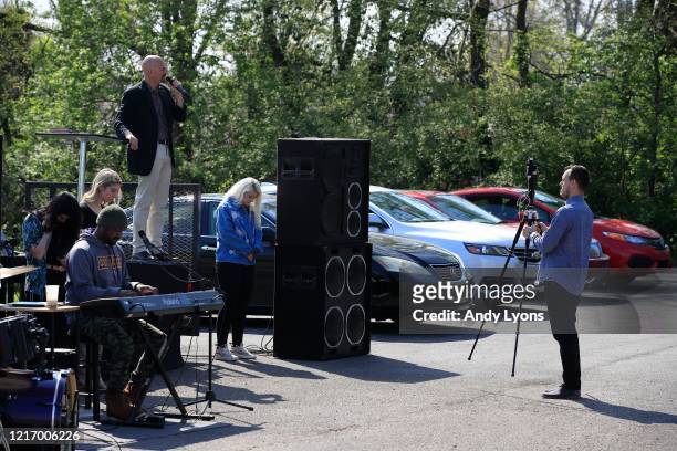 Pastor Chuck Salvo delivers his sermon to the congregation during the drive-in service at On Fire Christian Church on April 05, 2020 in Louisville,...