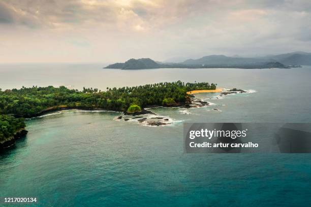 wide panorama from the islet of rolas - são tomé e principe stock-fotos und bilder