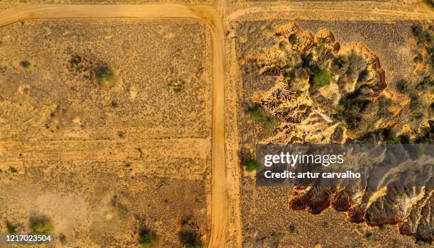 dramatic landscape and car from above, dirt roads - rally car stock pictures, royalty-free photos & images