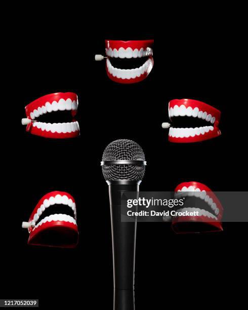 microphone with chattering teeth - comedian mic stock pictures, royalty-free photos & images