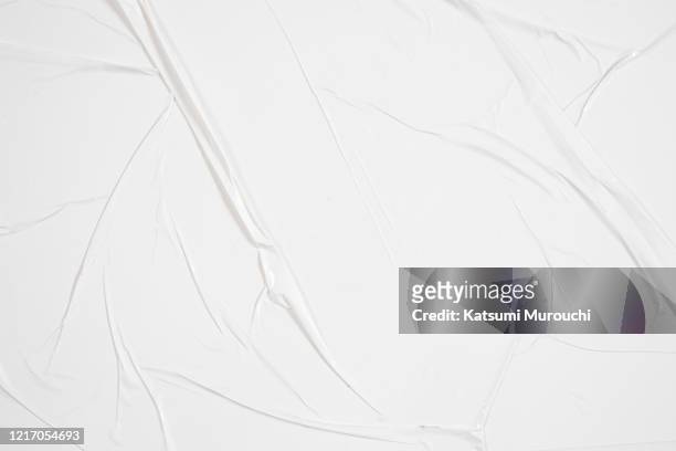 wrinkled glued paper texture background - wrinkles fotografías e imágenes de stock