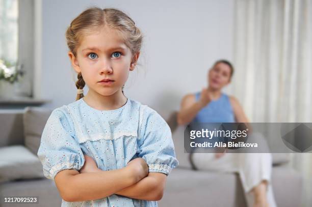 family conflict of mother and daughter. - faces of the conflict stock pictures, royalty-free photos & images