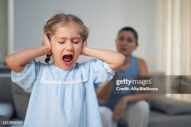 family conflict of mother and daughter. - selfishness stock pictures, royalty-free photos & images