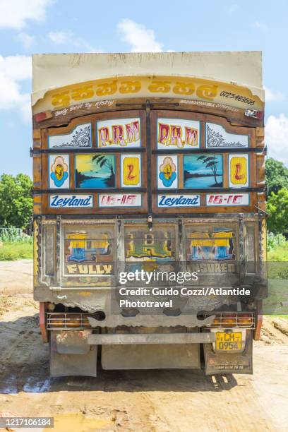 truck along the road from trincomalee to batticaloa - indian truck stock pictures, royalty-free photos & images