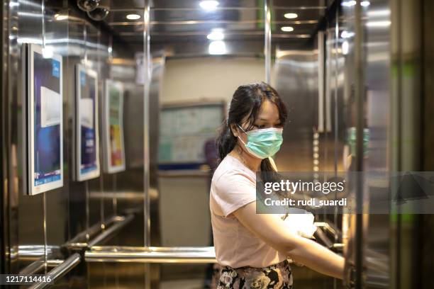 woman with face protective mask - claustrophobia stock pictures, royalty-free photos & images