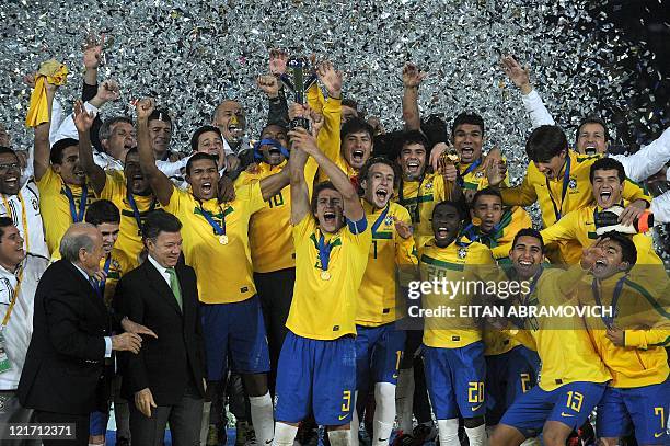 Brazilian players celebrate after beating Portugal in the FIFA 2011 Under-20 World Cup final match in Bogota on August 20, 2011. Brazil won 3-2 in...