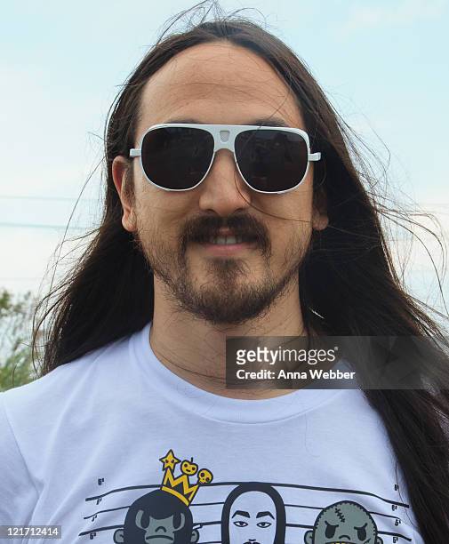 Steve Aoki poses backstage during the 2011 Identity Festival at Nikon at Jones Beach Theater on August 21, 2011 in Wantagh, New York.