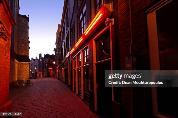 General view of the 'Windows' in the "Red Light District" which comes from the red neon lights that highlight the windows where prostitution is...