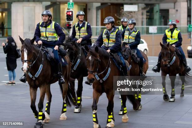 Mounted Police seen riding across Oxford St on their way to the Protest at the Archibald Fountain in Hyde Park on 02 June, 2020 in Sydney, Australia....