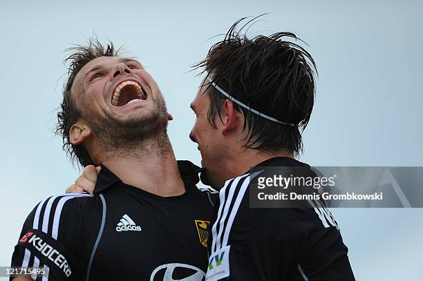 Moritz Fuerste of Germany celebrates with team mate Christopher Wesley after scoring his team's third goal during the Men´s EuroHockey Championships...