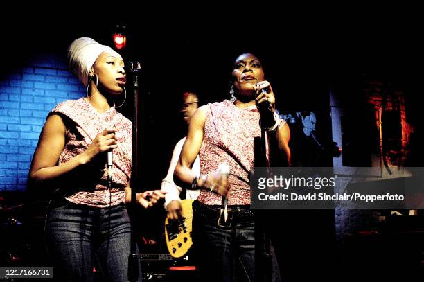 Singers Sarah Brown and Dee Johnson perform live on stage at Ronnie Scott's Jazz Club in Soho, London on 14th February 2003.