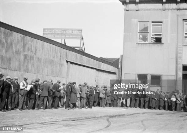 Queue of unemployed men at soup kitchen, New York, 1934.