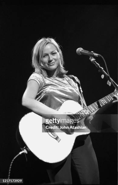 Singer, songwriter and guitarist Jewel Kilcher generally known just by her first name Jewel, is shown performing on stage during a "live" concert...