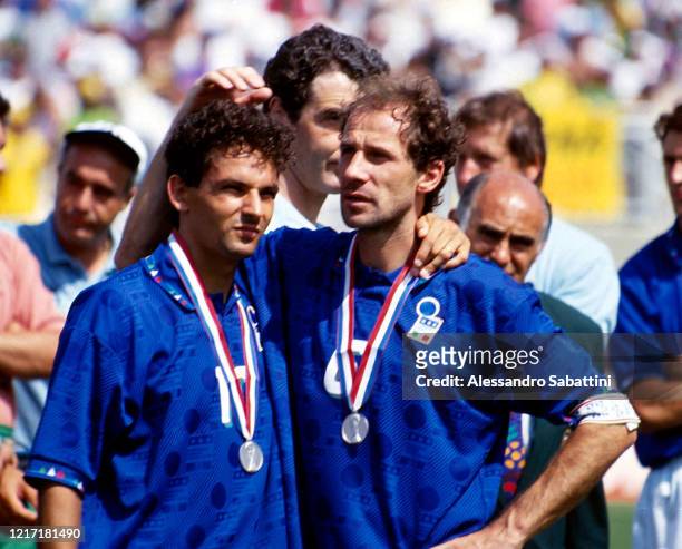 Roberto Baggio and Franco Baresi of Italy show their dejection after losing the match during the Final FIFA World Cup 1994 match between Brazil and...